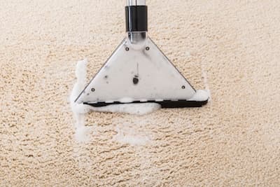 Máquina de extracción de agua para una moqueta compatible
