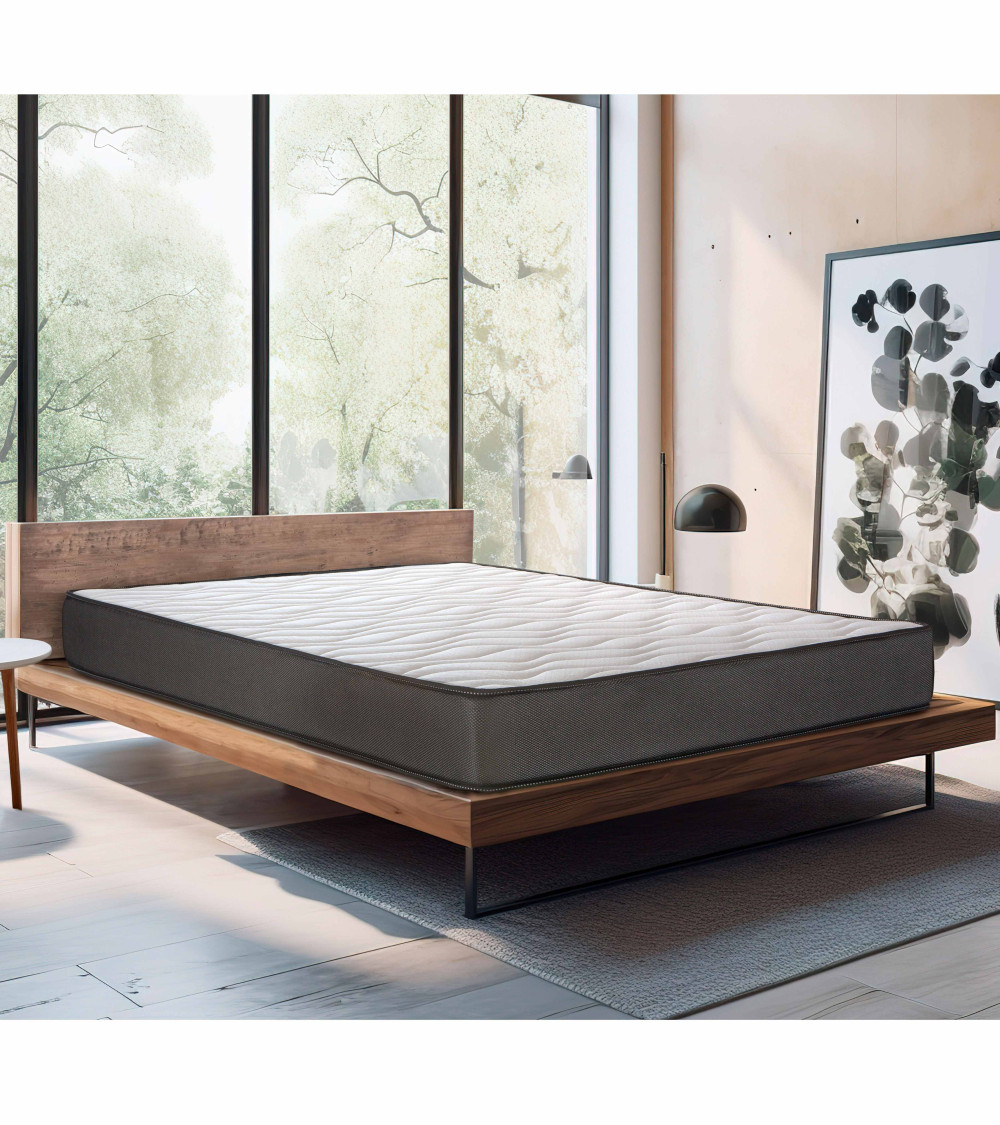 Colchón Home Heavenly TOC 15 colocado sobre una cama de madera