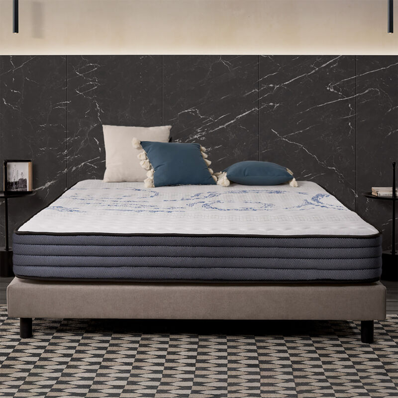 Colchón Naturalex Perfect Sleep de la oferta 90 × 200 colocado sobre una cama